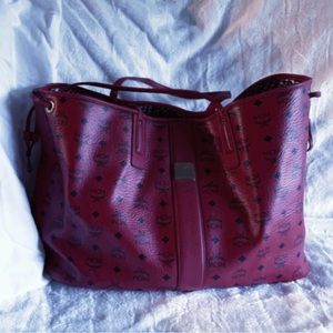 Large ruby red MCM Liz Tote with large pouch.